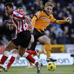 Clash between Kevin Doyle and Anton Ferdinand: A Intense Moment in the Wolverhampton Wanderers vs Sunderland Barclays Premier League Match