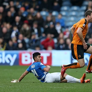 Wolverhampton Wanderers Kevin McDonald Outmaneuvers QPR's Massimo Luongo in Sky Bet Championship Match