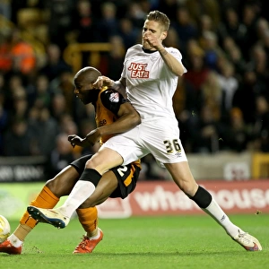 Wolves vs Derby County: Intense Battle for Supremacy - Afobe vs Albentosa at Molineux Stadium (Sky Bet Championship)