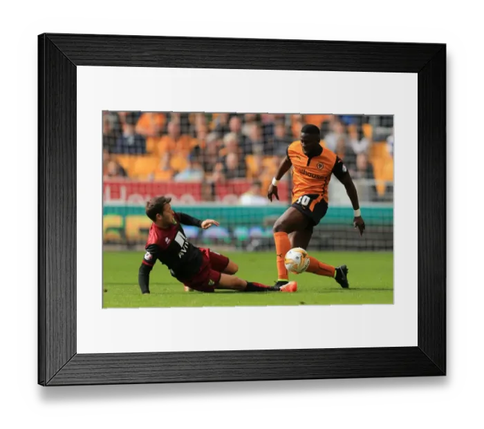 Framed Print : Intense Battle for Ball Possession: Wolverhampton Wanderers vs Norwich City - Sky Bet Championship