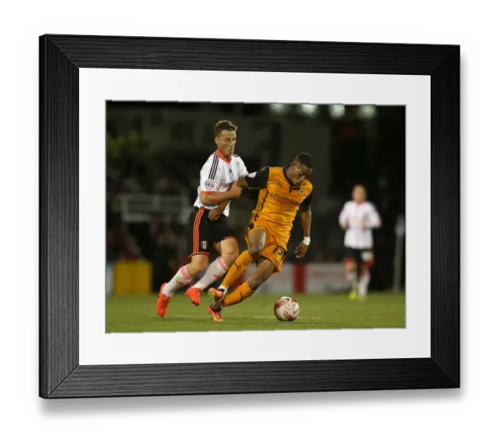Framed Print : Intense Battle for Championship Supremacy: Parker vs. van La Parra - Wolverhampton Wanderers vs. Fulham