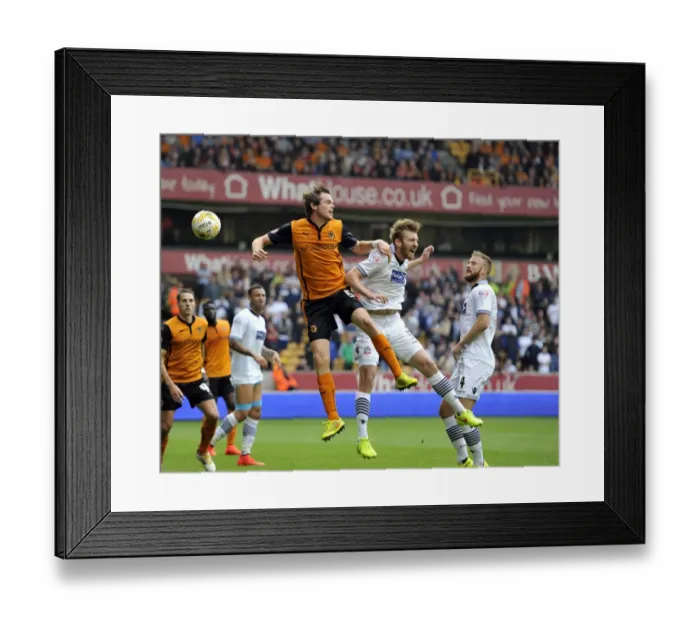 Framed Print : Intense Header Battle: Stearman vs. Ream at Molineux - Sky Bet Championship Showdown Framed Print : Intense Header Battle: Stearman vs. Ream at Molineux - Sky Bet Championship Showdown