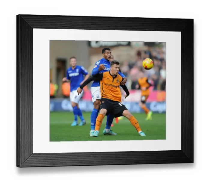 Framed Print : Intense Rivalry: Wolverhampton Wanderers vs Birmingham City - Battle for Championship Supremacy (Evans vs Davis)