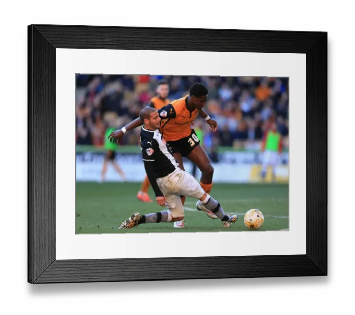 Framed Print : Intense Battle for Supremacy: Hause vs. Guedioura - Wolves vs. Watford (Sky Bet Championship)