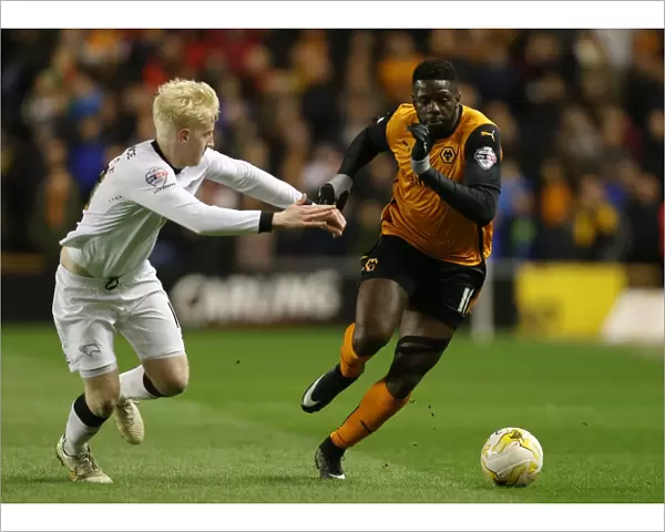 Wolves vs Derby County: Intense Battle Between Bakary Sako and Will Hughes in Sky Bet Championship Match