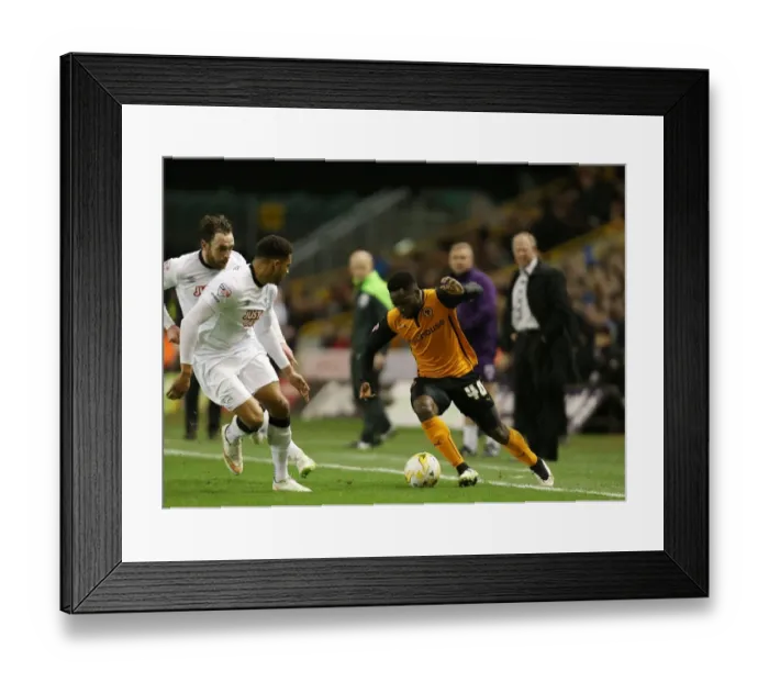 Framed Print : Wolves vs Derby County: Intense Battle Between Nouha Dicko and Cyrus Christie at Molineux Stadium (Sky Bet Championship) Framed Print : Wolves vs Derby County: Intense Battle Between Nouha Dicko and Cyrus Christie at Molineux Stadium (Sky Bet Championship)