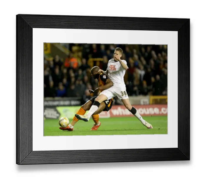 Framed Print : Wolves vs Derby County: Intense Battle for Supremacy - Afobe vs Albentosa at Molineux Stadium (Sky Bet Championship) Framed Print : Wolves vs Derby County: Intense Battle for Supremacy - Afobe vs Albentosa at Molineux Stadium (Sky Bet Championship)