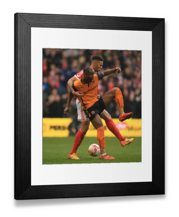 Framed Print : Jamaal Lascelles vs. Benik Afobe: A Championship Showdown at Nottingham Forest's City Ground - Wolverhampton Wanderers vs. Nottingham Forest