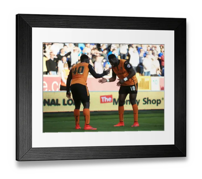 Framed Print : Wolves Dicko and Sako Celebrate Double Strike: Molineux's Euphoria in Sky Bet Championship (Wolves v Leeds United)