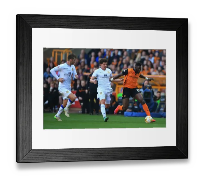 Framed Print : Wolves Bakary Sako Outruns Leeds United's Defenders at Molineux Stadium