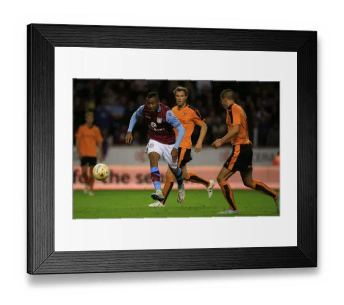 Framed Print : Wolves vs. Aston Villa: Jordan Ayew Sparks Action at Molineux (Pre-Season Friendly)