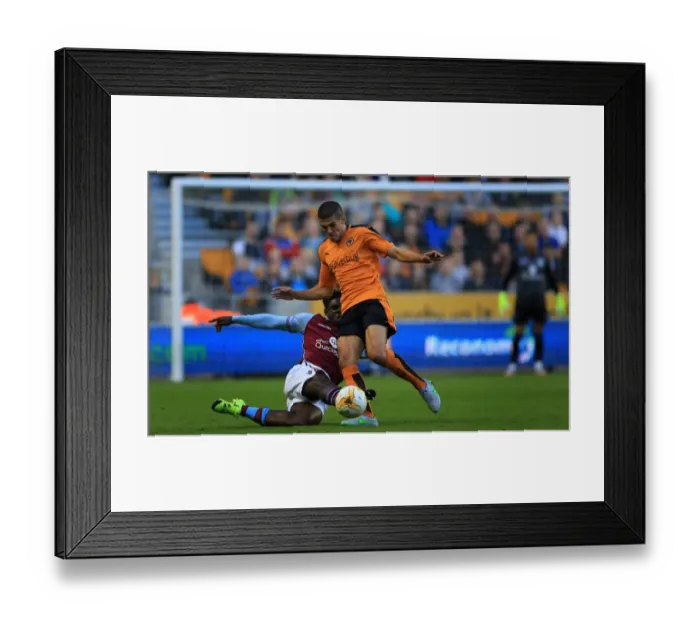 Framed Print : Conor Coady Stands Strong Against Micah Richards Challenge: Wolves vs Aston Villa Pre-Season Friendly