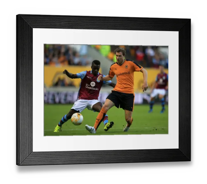 Framed Print : Wolves vs Aston Villa: A Pre-Season Battle - McDonald vs Gueye