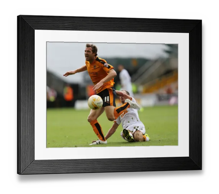 Framed Print : Wolves vs Hull City Showdown: A Championship Battle between McDonald and Meyler at Molineux