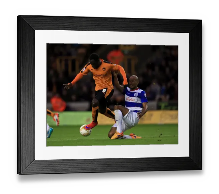 Framed Print : Intense Rivalry: Nouha Dicko vs. Karl Henry Battle at Molineux Stadium (Sky Bet Championship)