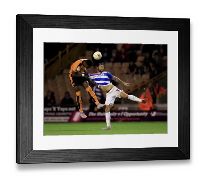 Framed Print : Wolves vs. Queens Park Rangers: Intense Battle for the Ball between Charlie Austin and Kortney Hause