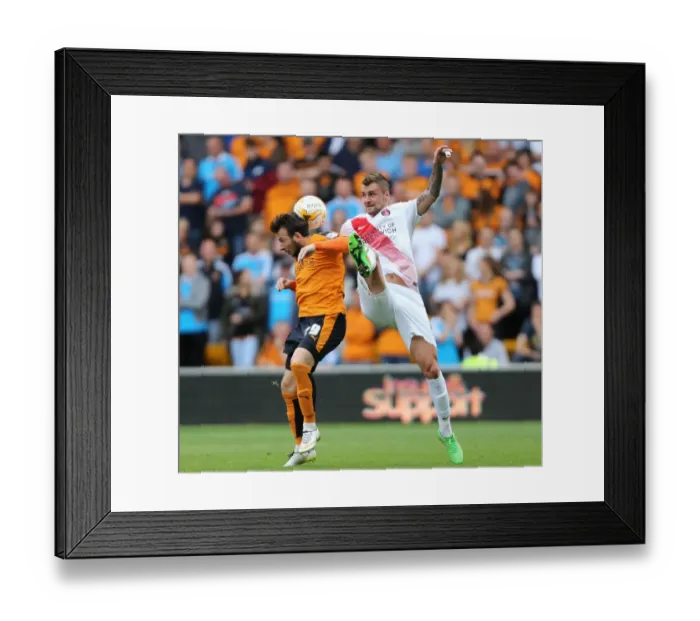 Framed Print : Wolves vs Charlton Athletic: Adam Le Fondre and Patrick Bauer Clash in Sky Bet Championship Match Framed Print : Wolves vs Charlton Athletic: Adam Le Fondre and Patrick Bauer Clash in Sky Bet Championship Match
