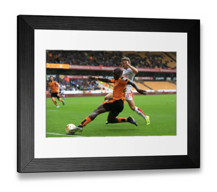 Framed Print : Wolves vs Huddersfield: Intense Battle for Ball Possession - Sheyi Ojo vs Martin Cranie (Sky Bet Championship) Framed Print : Wolves vs Huddersfield: Intense Battle for Ball Possession - Sheyi Ojo vs Martin Cranie (Sky Bet Championship)