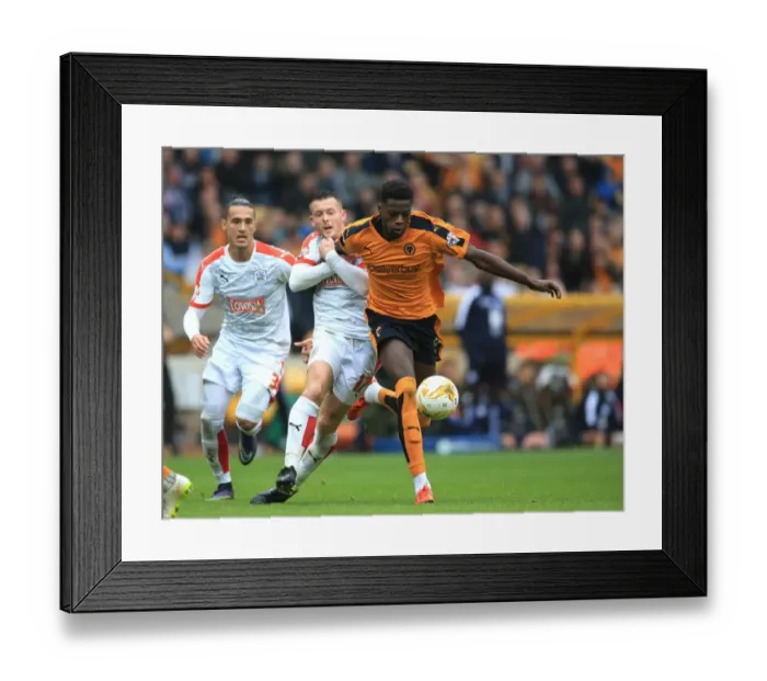 Framed Print : Intense Rivalry: Dominic Iorfa vs Harry Bunn Battle – Wolverhampton Wanderers vs Huddersfield Town Championship Clash Framed Print : Intense Rivalry: Dominic Iorfa vs Harry Bunn Battle – Wolverhampton Wanderers vs Huddersfield Town Championship Clash