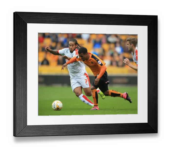 Framed Print : Wolves vs. Huddersfield: Intense Battle for Possession - Sky Bet Championship Framed Print : Wolves vs. Huddersfield: Intense Battle for Possession - Sky Bet Championship