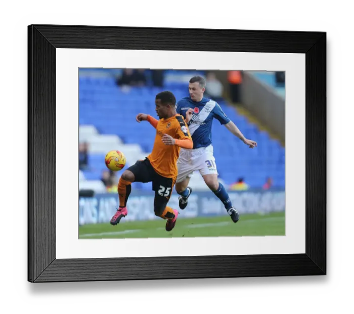 Framed Print : Wolves vs Birmingham City: Intense Battle for the Ball in Sky Bet Championship Framed Print : Wolves vs Birmingham City: Intense Battle for the Ball in Sky Bet Championship