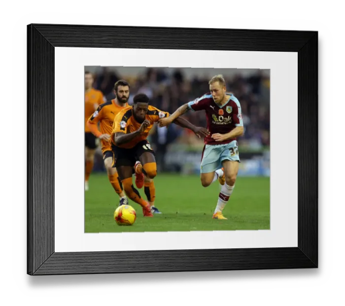Framed Print : Intense Rivalry: Iorfa vs Arfield - Wolves vs Burnley's Championship Battle Framed Print : Intense Rivalry: Iorfa vs Arfield - Wolves vs Burnley's Championship Battle