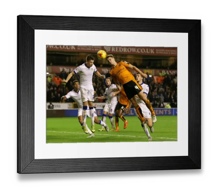 Framed Print : Wolves vs Leeds United: David Edwards Headed Goal Attempt (Sky Bet Championship) Framed Print : Wolves vs Leeds United: David Edwards Headed Goal Attempt (Sky Bet Championship)