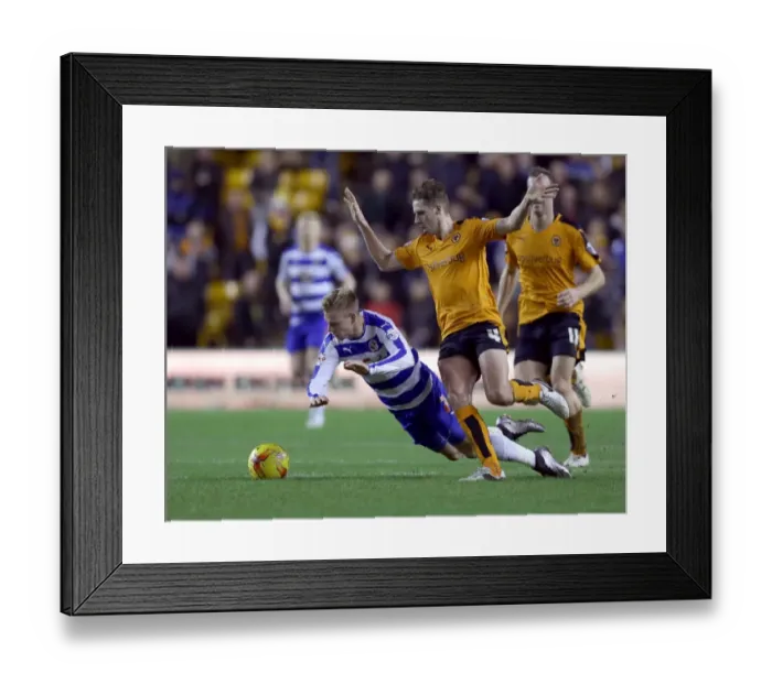 Framed Print : Wolverhampton Wanderers vs. Reading: Clash at Molineux - Edwards Fouls Vydra in Sky Bet Championship Match Framed Print : Wolverhampton Wanderers vs. Reading: Clash at Molineux - Edwards Fouls Vydra in Sky Bet Championship Match
