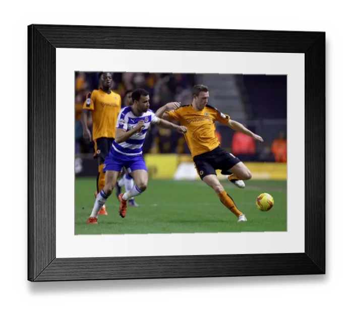 Framed Print : Intense Battle for Championship Supremacy: Wolverhampton Wanderers vs. Reading - Wolves Kevin McDonald vs. Hal Robson-Kanu