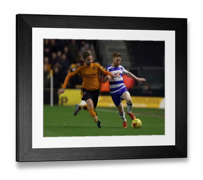 Framed Print : Battle for Supremacy: Doherty vs. Quinn in Wolves vs. Reading Championship Clash
