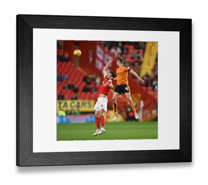 Framed Print : Wolverhampton Wanderers vs Charlton Athletic: Intense Battle for the Sky Bet Championship Ball (2014-15)