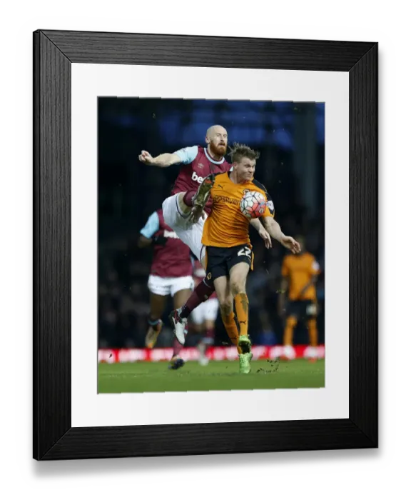 Framed Print : Collins vs. Sigurdarson: A FA Cup Battle for Possession - Wolverhampton Wanderers vs. West Ham United Framed Print : Collins vs. Sigurdarson: A FA Cup Battle for Possession - Wolverhampton Wanderers vs. West Ham United