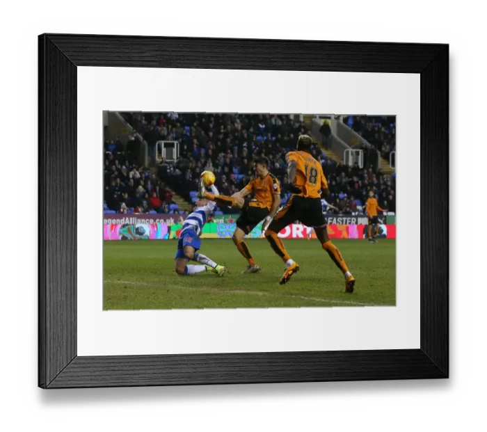 Framed Print : Intense Showdown: Rakels vs. Batth in Sky Bet Championship's Wolves vs. Reading Match Framed Print : Intense Showdown: Rakels vs. Batth in Sky Bet Championship's Wolves vs. Reading Match