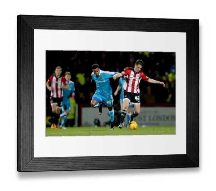 Framed Print : Sky Bet Championship Showdown: Wolverhampton Wanderers vs. Brentford at Griffin Park Framed Print : Sky Bet Championship Showdown: Wolverhampton Wanderers vs. Brentford at Griffin Park
