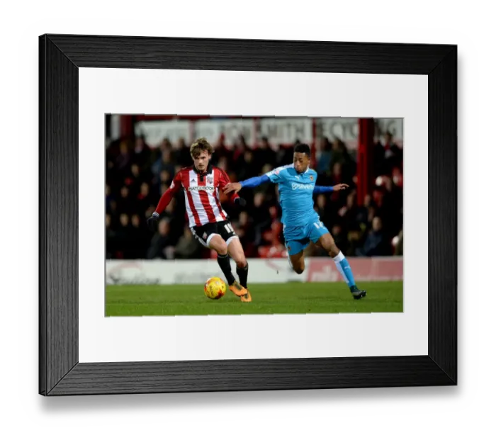 Framed Print : Wolverhampton Wanderers vs. Brentford: A Championship Showdown at Griffin Park