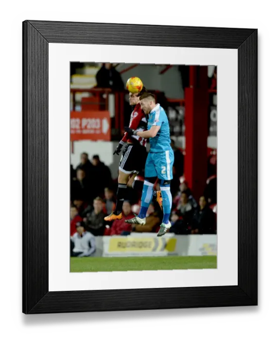 Framed Print : Wolverhampton Wanderers vs. Brentford: A Sky Bet Championship Showdown at Griffin Park Framed Print : Wolverhampton Wanderers vs. Brentford: A Sky Bet Championship Showdown at Griffin Park