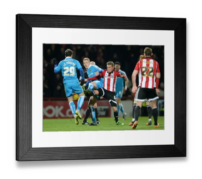 Framed Print : Sky Bet Championship Showdown: Brentford vs. Wolverhampton Wanderers at Griffin Park