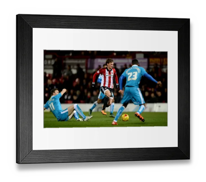 Framed Print : Showdown at Griffin Park: Wolverhampton Wanderers vs. Brentford in the Sky Bet Championship