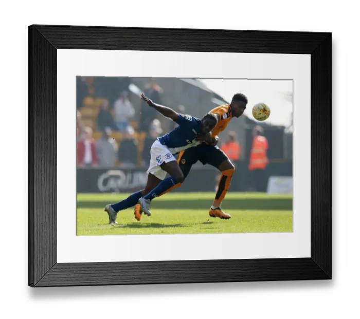 Framed Print : Intense Rivalry: Maghoma vs. Hause in Wolves vs. Birmingham City Championship Clash Framed Print : Intense Rivalry: Maghoma vs. Hause in Wolves vs. Birmingham City Championship Clash