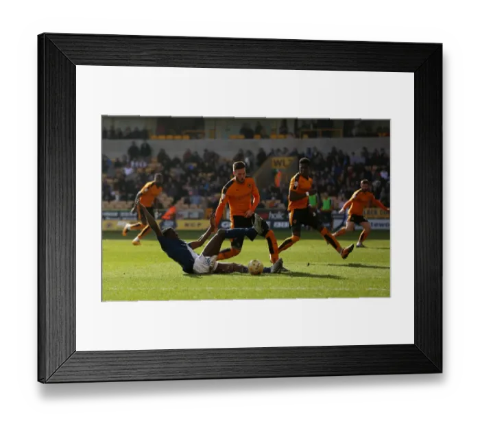 Framed Print : Wolves vs Birmingham City: Intense Moment as Doherty Challenges Donaldson in the Box