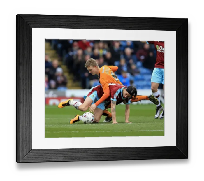 Framed Print : Intense Rivalry: Boyd vs. Saville - Burnley vs. Wolves, Sky Bet Championship at Turf Moor Framed Print : Intense Rivalry: Boyd vs. Saville - Burnley vs. Wolves, Sky Bet Championship at Turf Moor