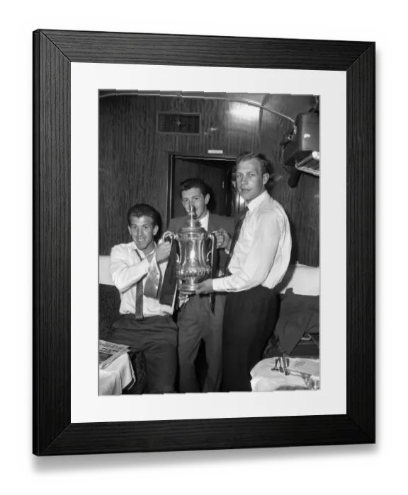 Framed Print : Wolverhampton Wanderers FA Cup Victory: Peter Broadbent, Gerry Mannion, and Malcolm Finlayson Celebrate on the Train Back to Wolverhampton Framed Print : Wolverhampton Wanderers FA Cup Victory: Peter Broadbent, Gerry Mannion, and Malcolm Finlayson Celebrate on the Train Back to Wolverhampton