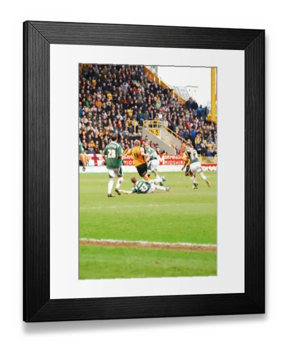Framed Print : Wolves vs Plymouth Argyle: A 2009 Battle at Molineux Stadium Framed Print : Wolves vs Plymouth Argyle: A 2009 Battle at Molineux Stadium