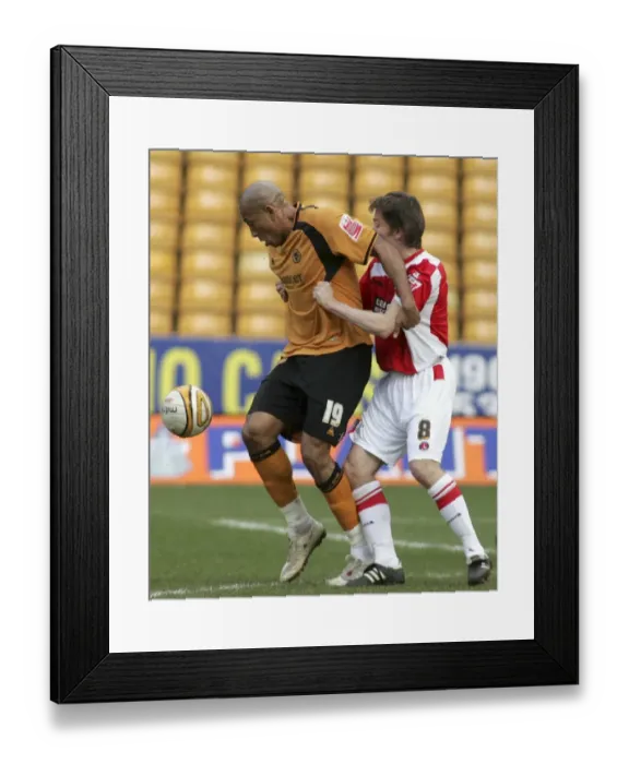 Framed Print : Chris Iwelumo vs Matt Holland: A Championship Battle at Molineux (March 14, 2009)