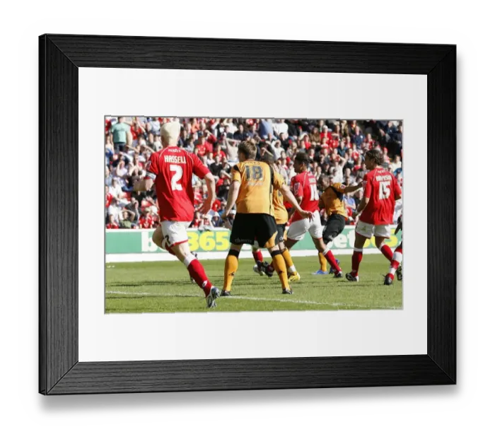 Framed Print : Wolverhampton Wanderers Kyle Reid in Action against Barnsley (2009) Framed Print : Wolverhampton Wanderers Kyle Reid in Action against Barnsley (2009)