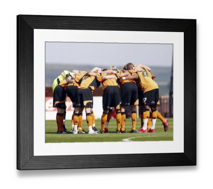 Framed Print : United in Determination: Wolverhampton Wanderers Before Barnsley Showdown, Championship 2009