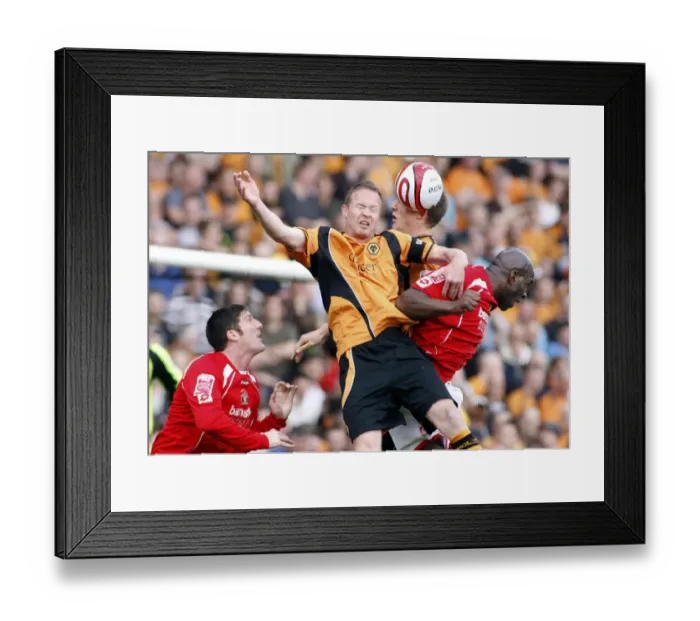 Framed Print : Intense Rivalry: Moore, Craddock, and Berra's Clash between Barnsley and Wolverhampton Wanderers in the 2009 Championship Battle Framed Print : Intense Rivalry: Moore, Craddock, and Berra's Clash between Barnsley and Wolverhampton Wanderers in the 2009 Championship Battle