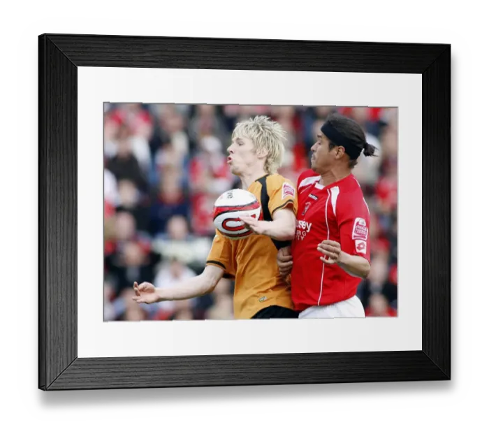 Framed Print : Denis Souza vs. Andrew Keogh: Championship Clash between Barnsley and Wolverhampton Wanderers, 2009