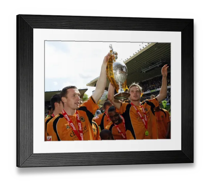 Framed Print : Wolverhampton Wanderers: Neill Collins and Richard Stearman Celebrate Championship Promotion with the Trophy Framed Print : Wolverhampton Wanderers: Neill Collins and Richard Stearman Celebrate Championship Promotion with the Trophy