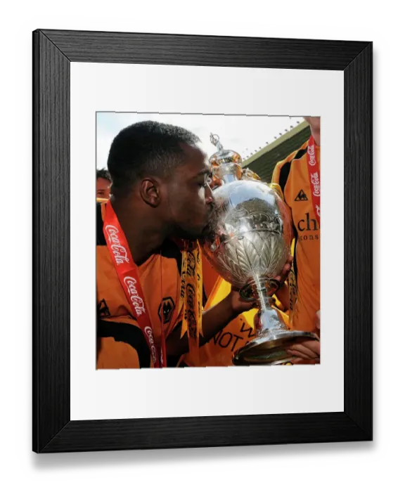 Framed Print : Wolverhampton Wanderers: Championship Victory - Sylvan Ebanks-Blake and the Trophy (2008-2009) Framed Print : Wolverhampton Wanderers: Championship Victory - Sylvan Ebanks-Blake and the Trophy (2008-2009)